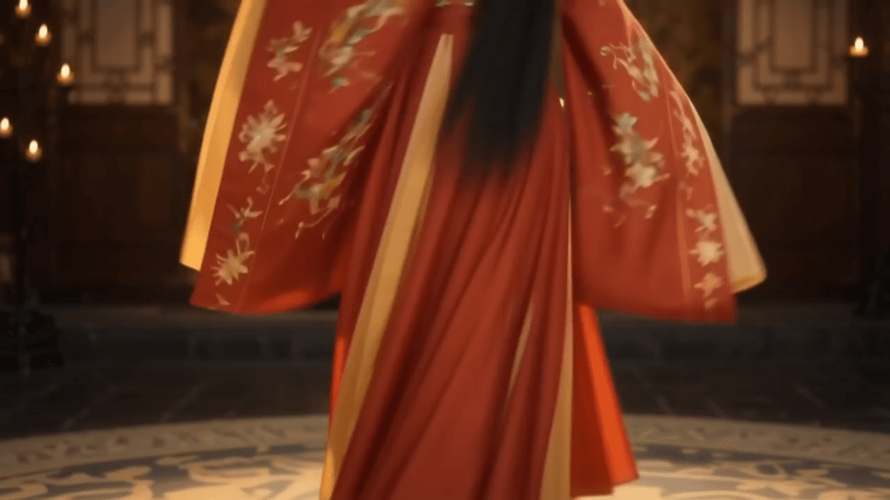 Un traje tradicional rojo girando en movimiento en el interior con estampados florales.