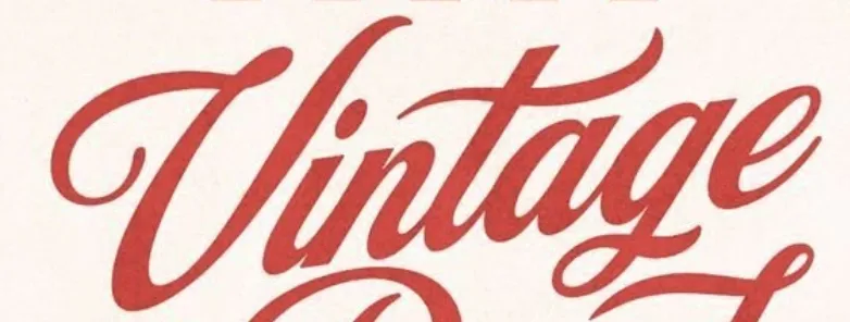 Testo stilizzato con la parola 'Vintage' in lettere corsive rosse.